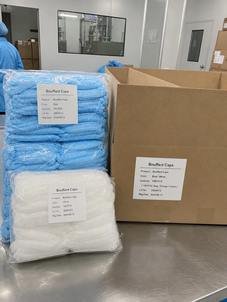 Standard polybag and master carton packaging for bouffant medical caps showing lot number labeling