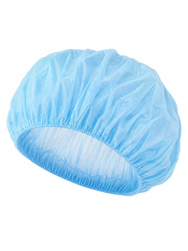 Disposable medical cap showing round dome shape with elastic band closure