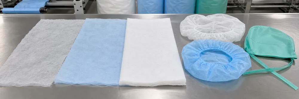 Spunbond polypropylene nonwoven fabric weight comparison showing different gsm levels used in medical cap production
