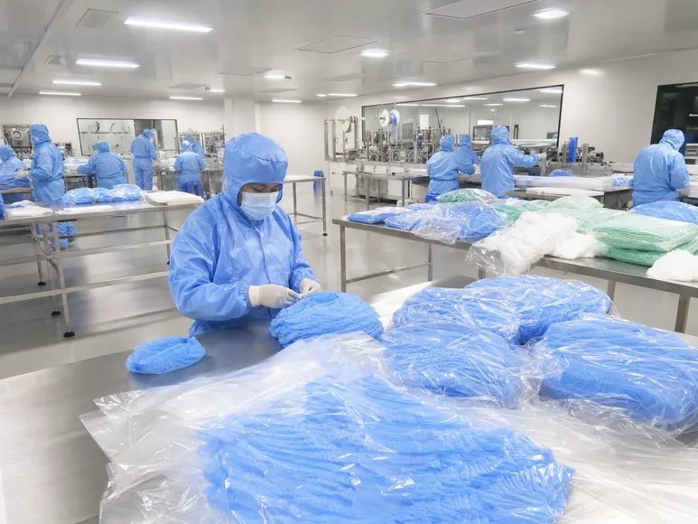 ISO 8 cleanroom production environment for surgical cap manufacturing