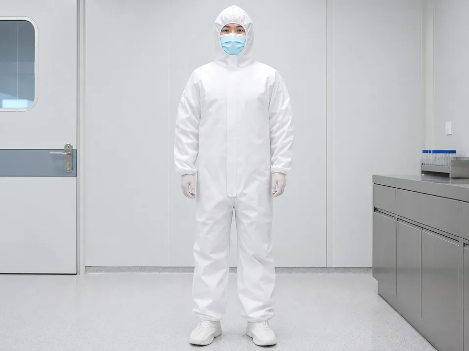 Full-length zipper with adhesive flap cover on disposable medical protective clothing, eliminating pull-tab gap