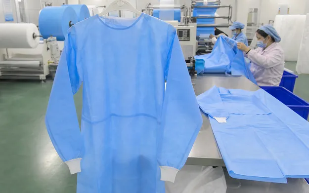 Medical isolation gown AAMI PB70 rated with ultrasonically welded seams