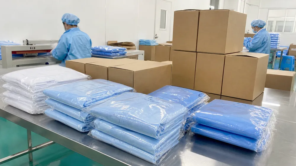 Custom OEM packaging and private-label isolation gown configurations