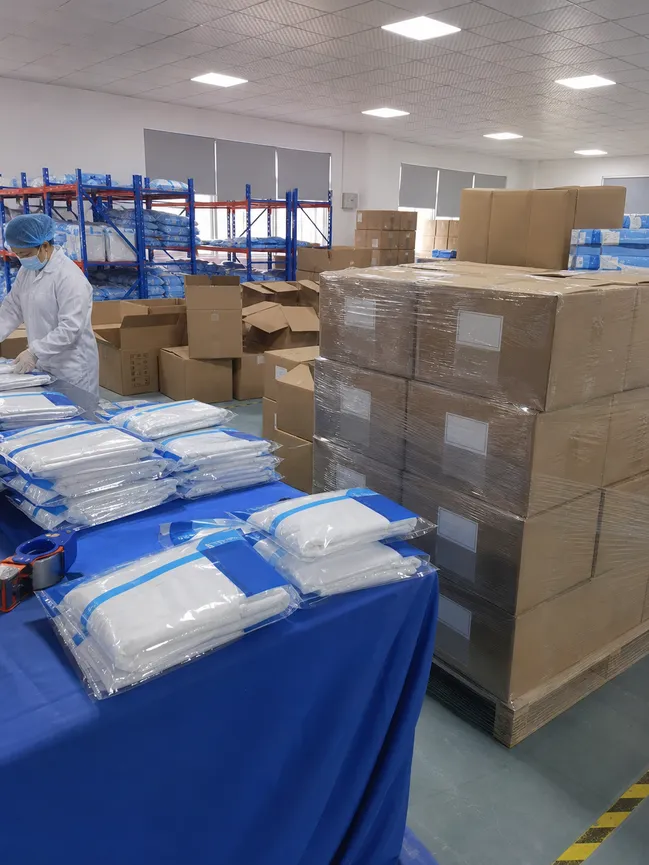 Private-label branded medical coverall packaging ready for export distribution