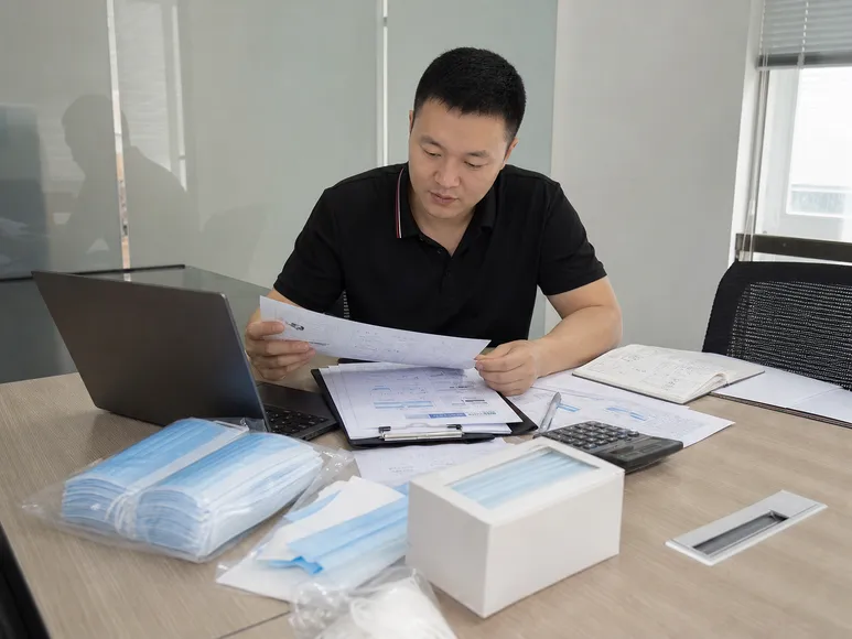 Buyer preparing medical mask quote request documentation