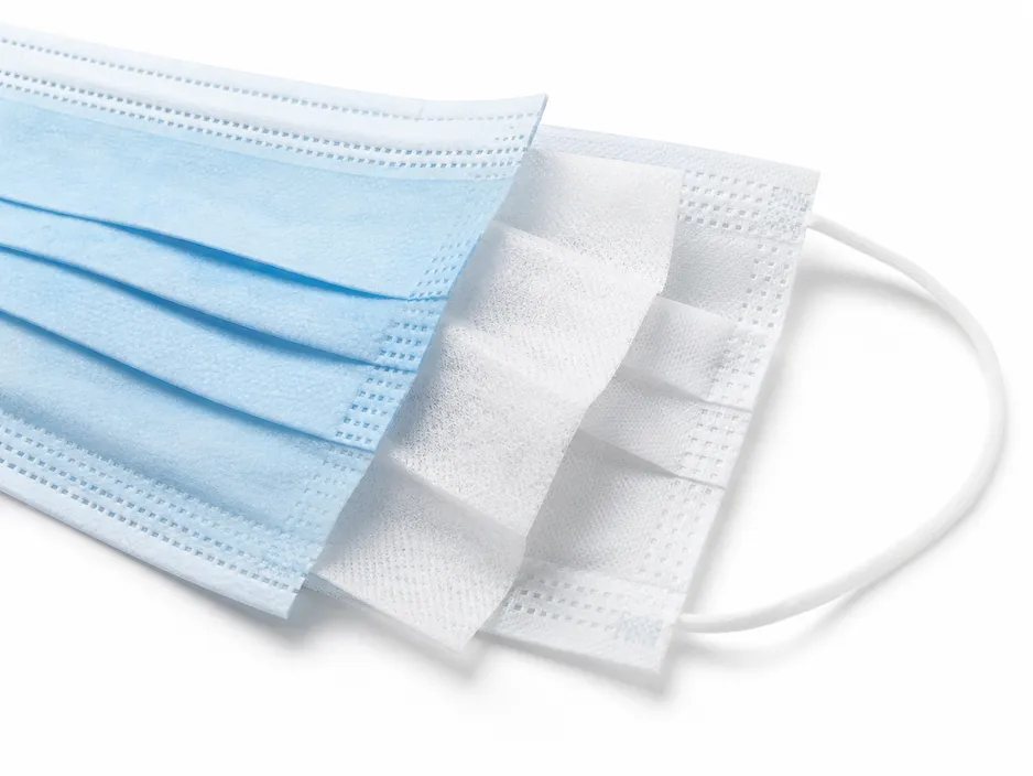 3 ply medical mask with visible three-layer construction showing spunbond and meltblown layers