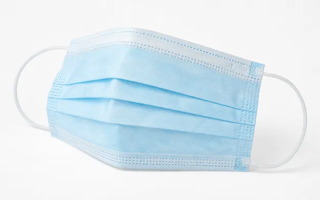 Disposable surgical medical mask — 3-ply flat-fold configuration with ear loops